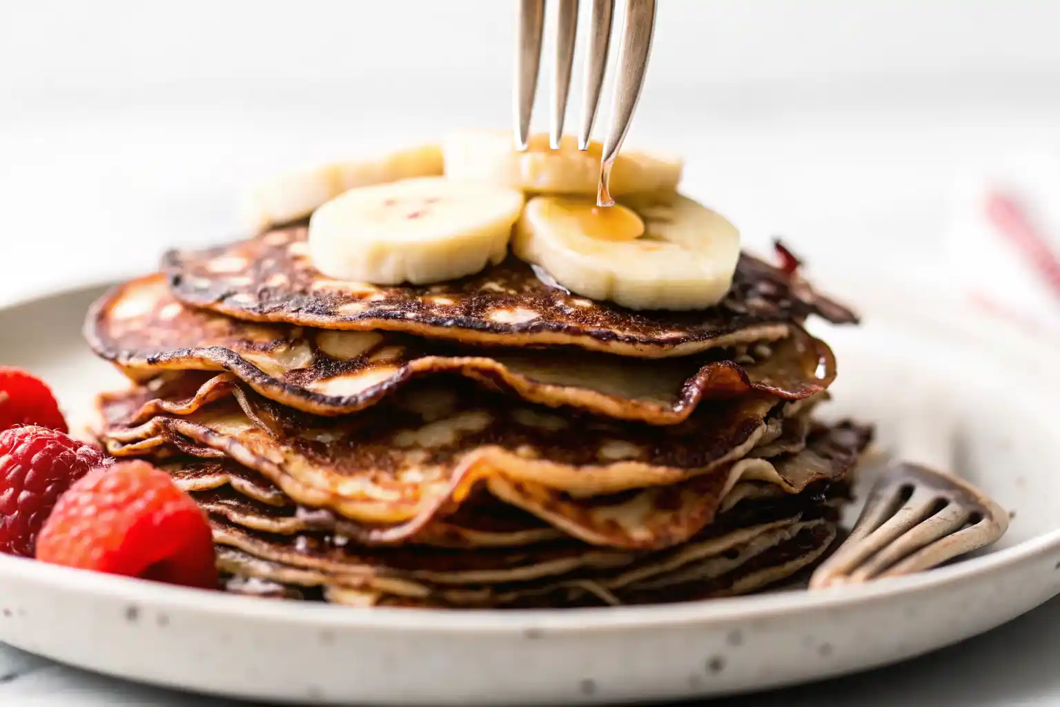 Easy cottage cheese pancakes no flour with maple syrup on a plate