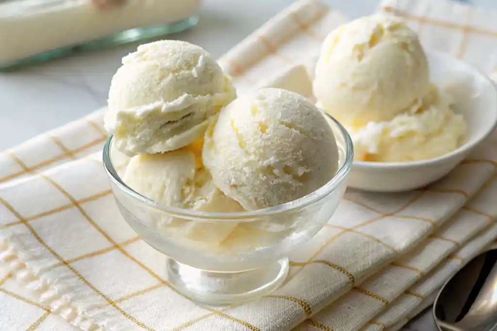 Close-up of creamy Ninja Creami cottage cheese ice cream recipe served in a bowl with smooth texture, healthy high protein dessert look