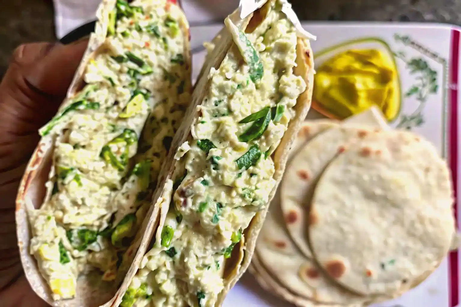 Ingredients for high protein smashed chicken salad with cottage cheese, Greek yogurt, shredded chicken, celery, and lemon.