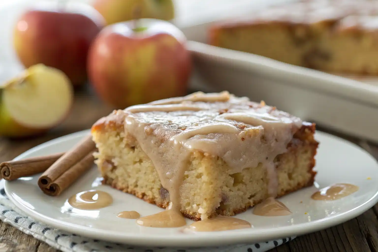 Mixing batter for moist apple cake with cinnamon icing in a ceramic bowl.